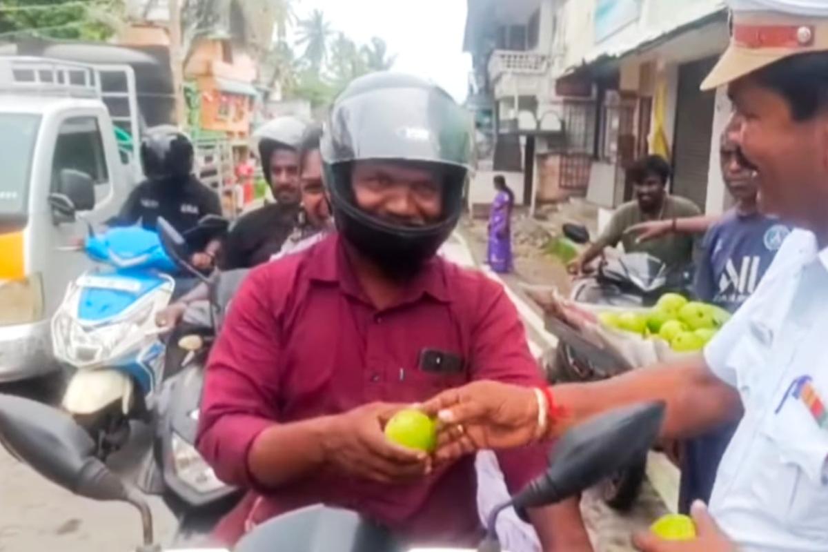 Thuckalay-Police-officer-surprises-motorists-who-were-wearing-helmets