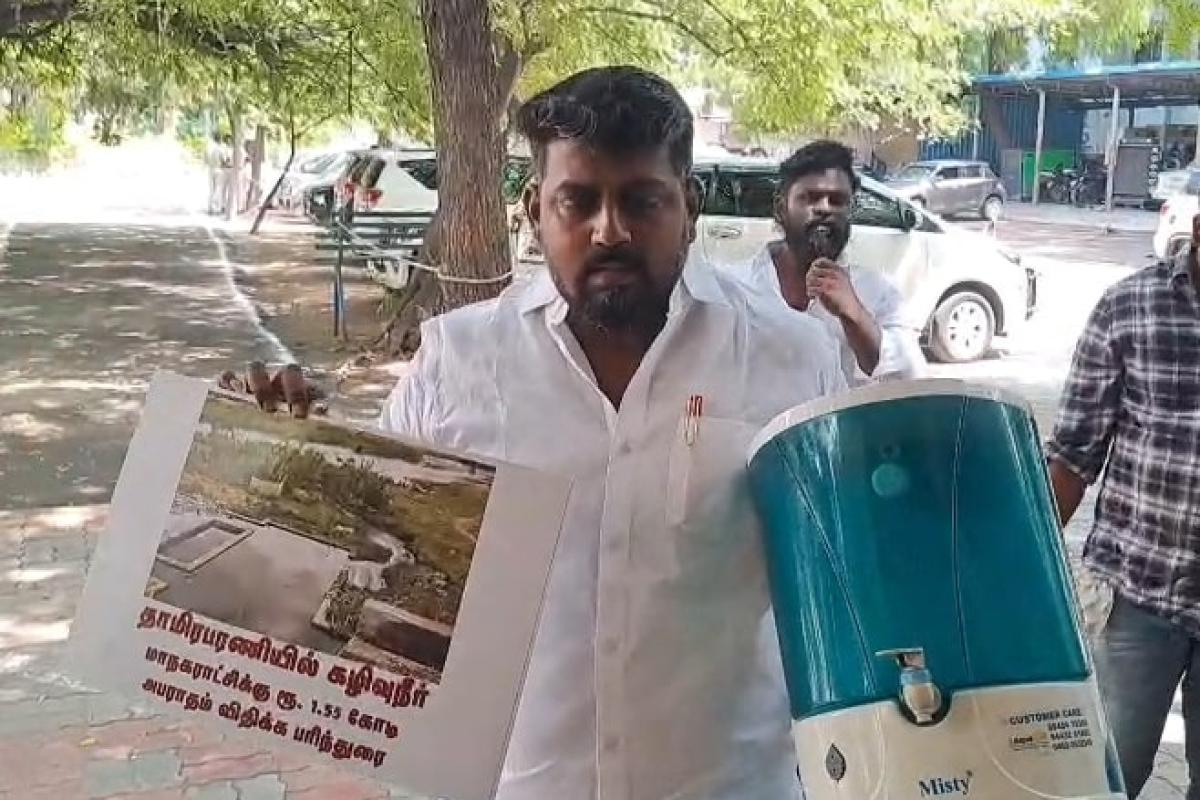 councilor-s-innovative-protest-with-water-purification-machine-at-the-nellai-corporation-meeting