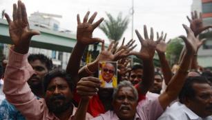 Is Karunanidhi curing by himself or DMK volunteers prayings making him to cure