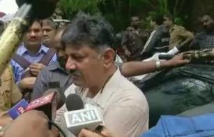 Karnataka-minister-DK-Siva-Kumar-arrested-Mumbai-for-sits-dharna-in-front-of-hotel-where-the-rebel-MLAs-stayed