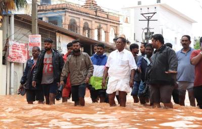 puducherry-chief-minister-inspects-flood-hit-areas-in-a-conducive-political-environment