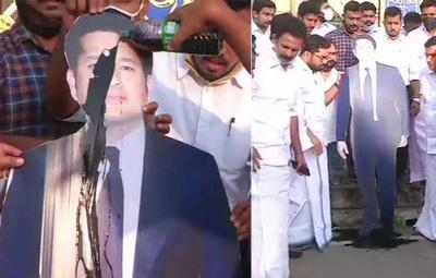 youth-congress-members-pour-black-oil-on-a-cut-out-of-sachin-tendulkar