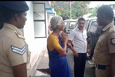Kanyakumari-A-young-man-stops-an-old-woman-from-doing-fish-trading