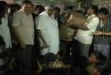 Karnataka minister who threw food items to people in shelters