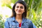 fans-ask-priya-varier-to-bite-het-lip