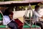 woman-in-an-auto-rickshaw-carried-the-body-of-her-corona-dead-husband-in-uttar-pradesh