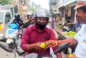 Thuckalay-Police-officer-surprises-motorists-who-were-wearing-helmets