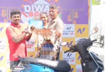 farmer-comes-to-buy-bike-with-affectionate-lamb-in-nellai